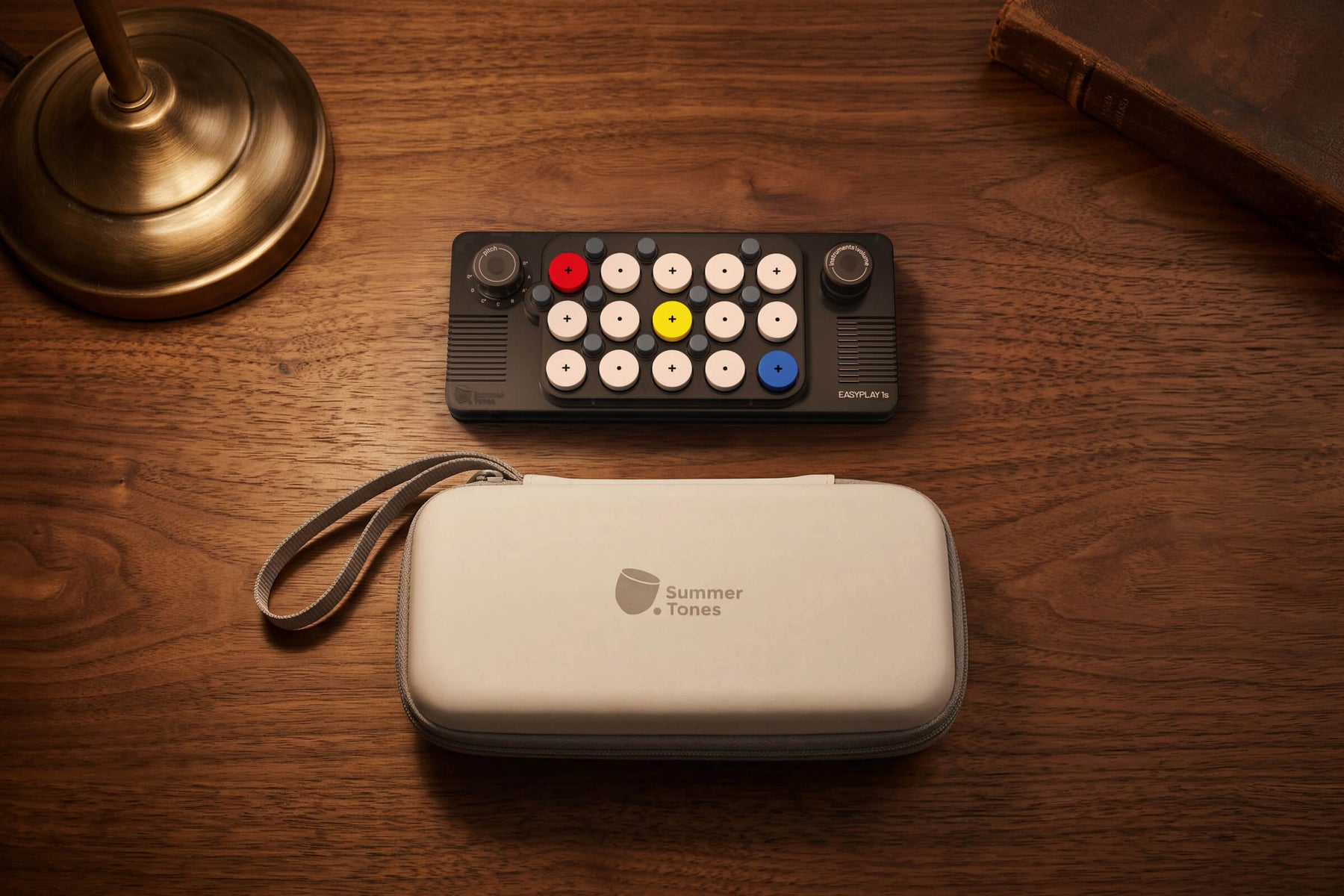 EASYPLAY 1S and carry case on a wood desk